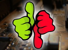 Thumbs up and down in front of a motherboard